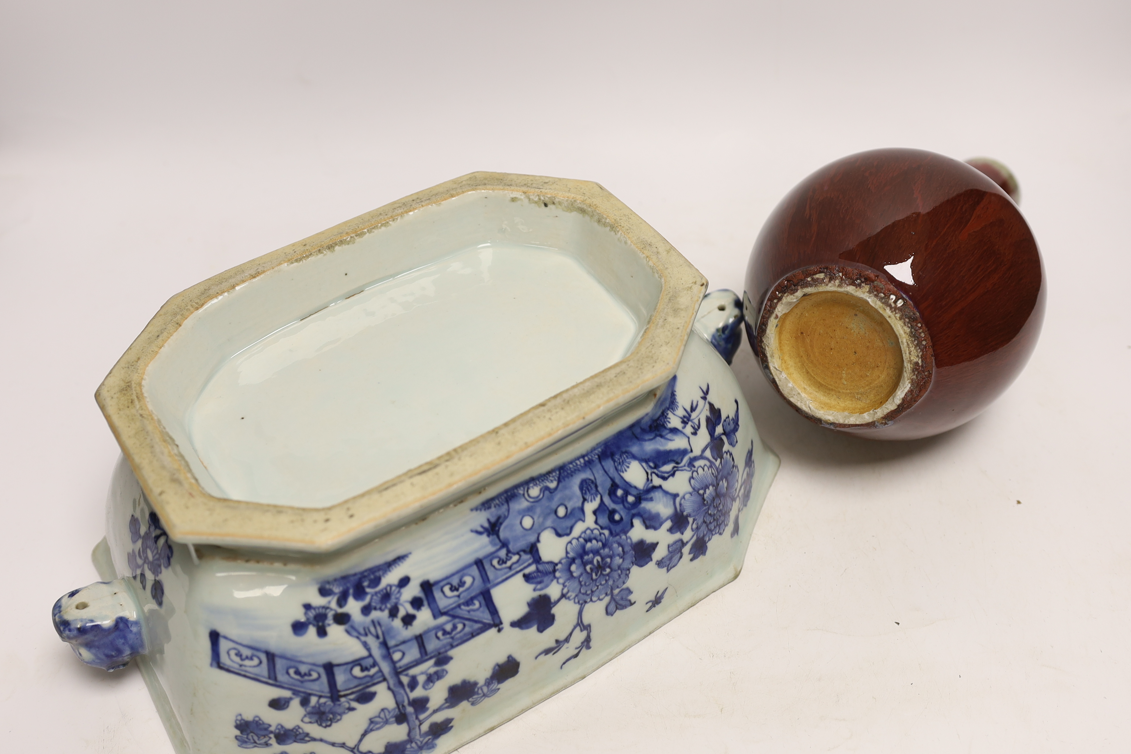 An 18th century Chinese blue and white tureen together with a sang de boeuf vase